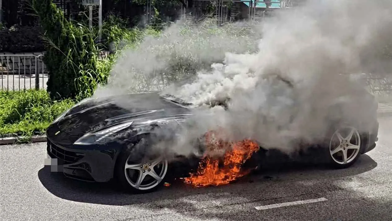 Ferrari mysteriously catches fire on a busy road, driver narrowly escapes